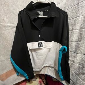 Brand new DKNY Black and White Sweater with Blue Accents
